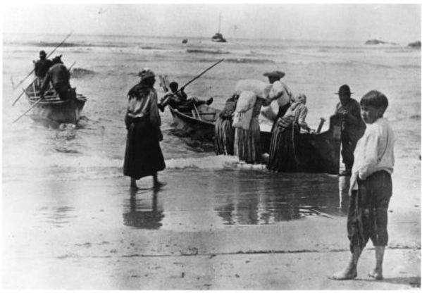 Families on the shores of La Push, WA by Charlotte Watts