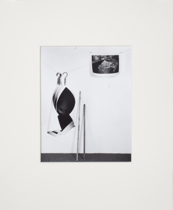 Wall Site (hanging photos & 2 sticks) by Leland Rice