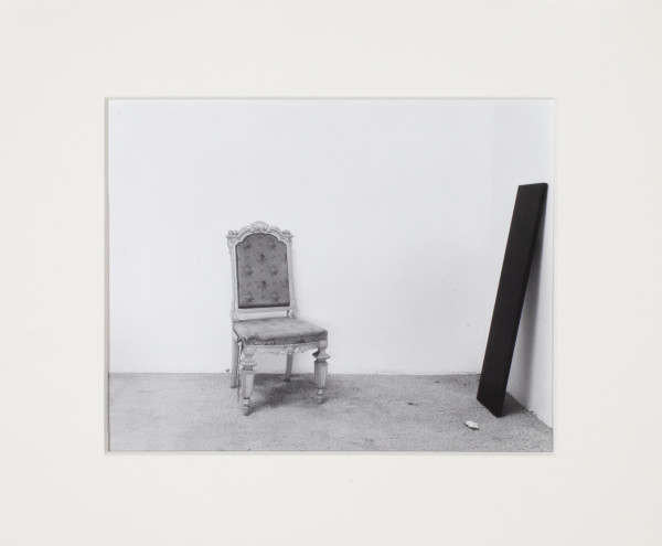 Wall Site (old chair & black wood board) by Leland Rice