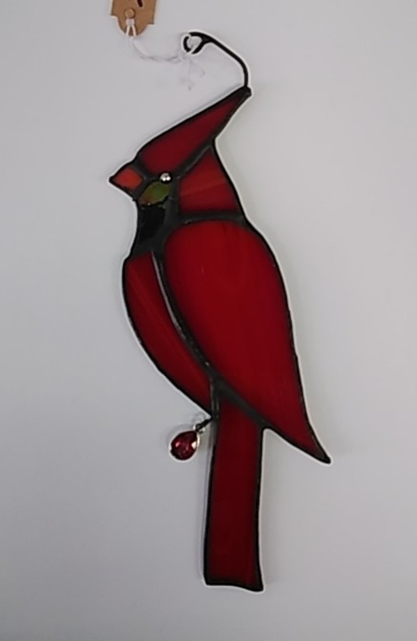 red cardinal bird with red gem by Craig Wills