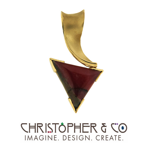 CMJ B 2022   Gold pendant set with rhodochrosite designed by Christopher M. Jupp .