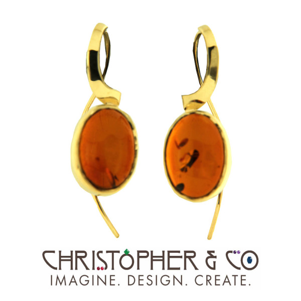 CMJ A 21090  Gold earring pair set with amber designed by Christopher M. Jupp