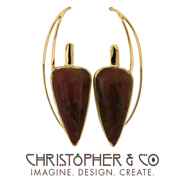CMJ B 22020  14 karat yellow gold earrings set with Dinosaur Bone cabachons & designed by Christopher M. Jupp.