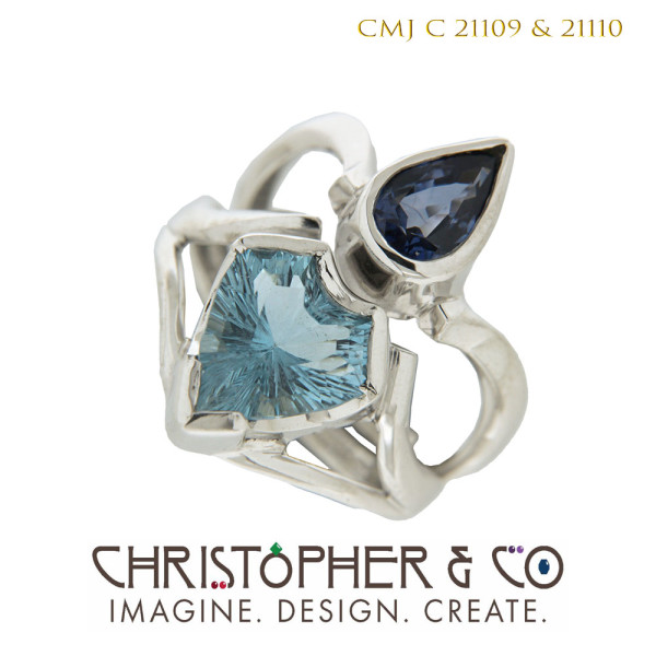 CMJ C 21109 & 21110 Two white gold ring by Christopher M. Jupp.  One set with blue sapphire, one with aquamarine hand cut by Richard Homer. by Christopher M. Jupp