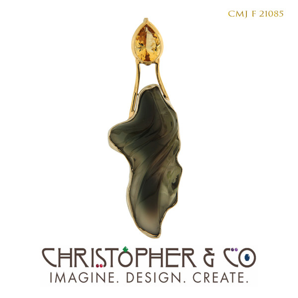 CMJ F 21085  Gold pendant designed by Christopher M. Jupp set with golden beryl and sunstone which was handcarved by Darryl Alexander. by Christopher M. Jupp