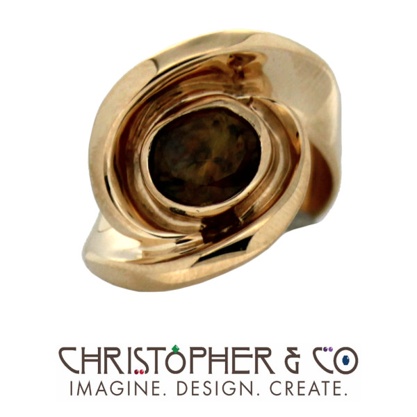 CMJ G 13010    Gold ring set with sphene designed by Christopher M. Jupp.