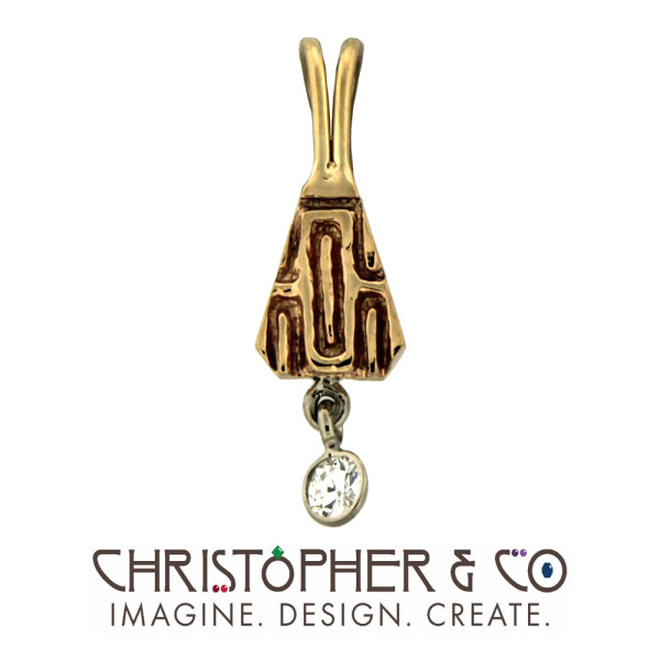 CMJ G 13036    Gold pendant set with diamond designed by Christopher M. Jupp.
