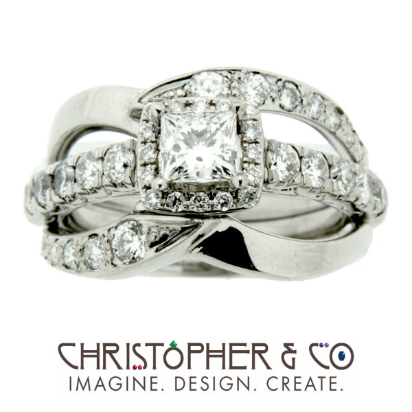 CMJ H 13168    Gold ring set with diamonds designed by Christopher M. Jupp.