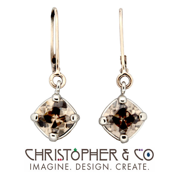 CMJ H 13177    Gold Earring pair set with faceted topaz pair designed by Christopher M. Jupp.