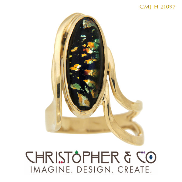 CMJ H 21097  Gold ring designed by Christopher M. Jupp set with oval cabachon. by Christopher M. Jupp