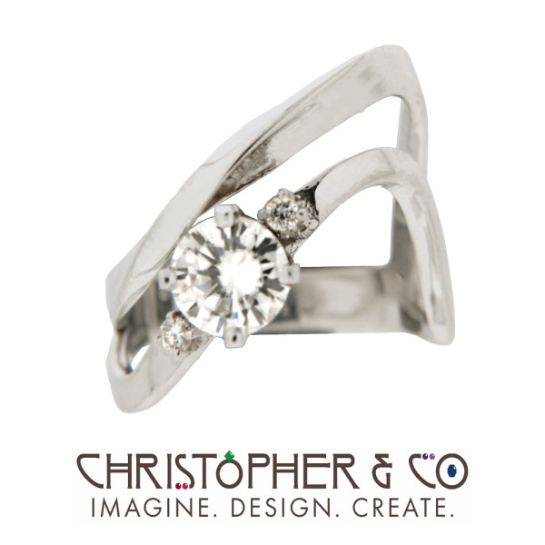 CMJ H 21120   White gold ring set with moisonite and diamonds designed by Christopher M. Jupp.
