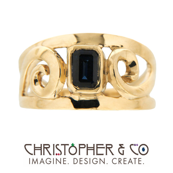CMJ J 21007 Gold ring designed by Christopher M. Jupp set with blue sapphire.