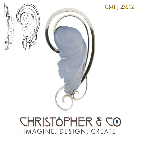CMJ J 23072 White gold pendant designed by Christopher M. Jupp.  The pendant is set with a blue chalcedony hand-carved by Darryl Alexander. by Christopher M. Jupp