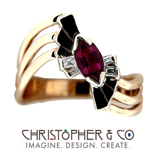 CMJ K 01329    Yellow & White Gold ring set with diamonds and marquis ruby designed by Christopher M. Jupp