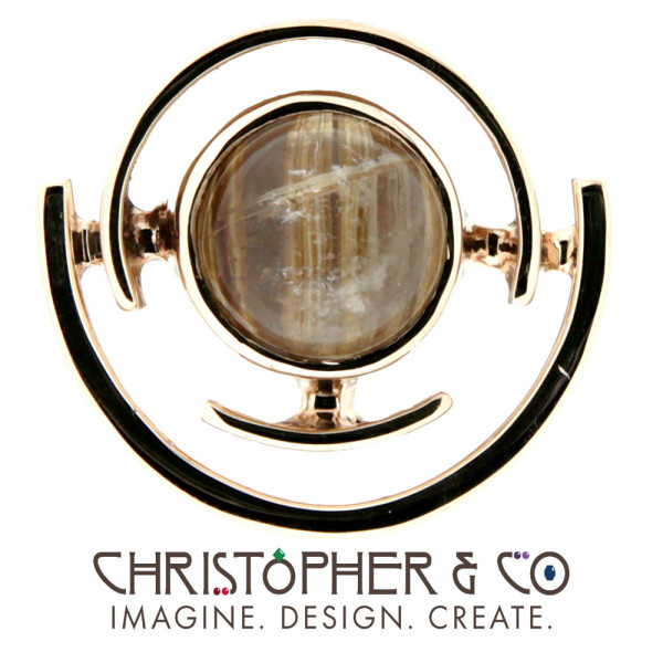 CMJ K 13094    Gold cuff links set with rutilated quartz designed by Christopher M. Jupp