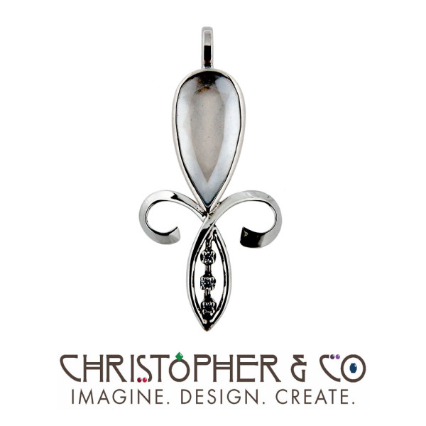 CMJ K 13149   Gold pendant set with moonstone & diamonds designed by Christopher M. Jupp.