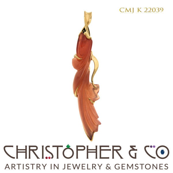 CMJ K 22039  Yellow gold pendant designed by Christopher M. Jupp set with grossular garnet handcarved by Darryl Alexander. by Christopher M. Jupp