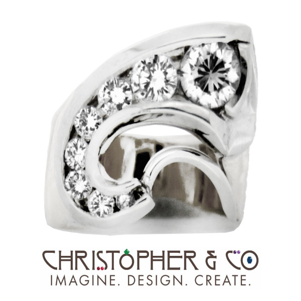 CMJ M 12204    Gold ring set with diamonds designed by Christopher M. Jupp.