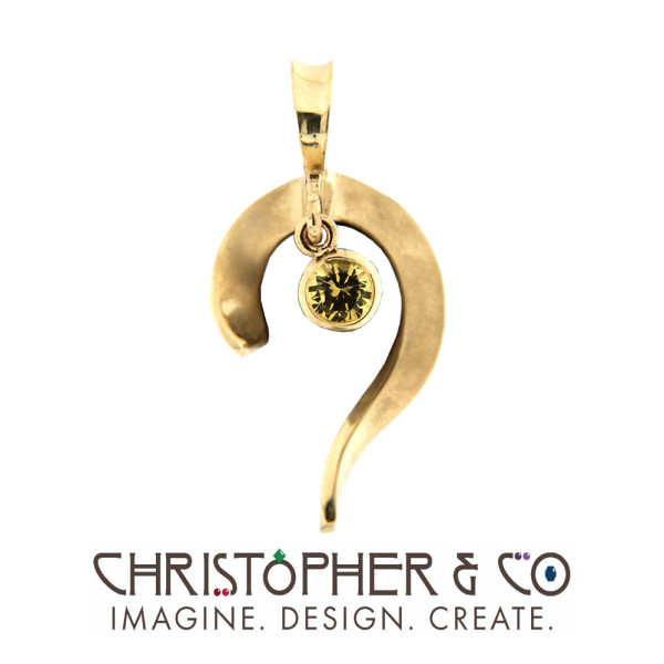 CMJ M 20141  Gold pendant set with yellow sapphire designed by Christopher M. Jupp.