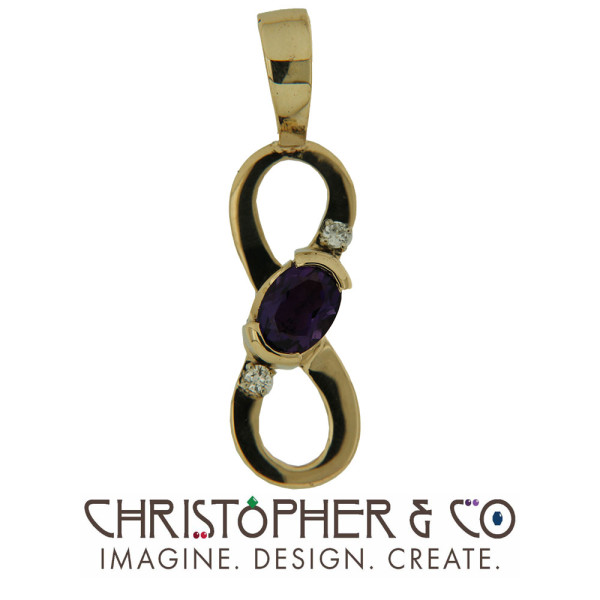 CMJ N 20110    Gold "infinity" symbol pendant set with amethyst and diamonds designed by Christopher M. Jupp