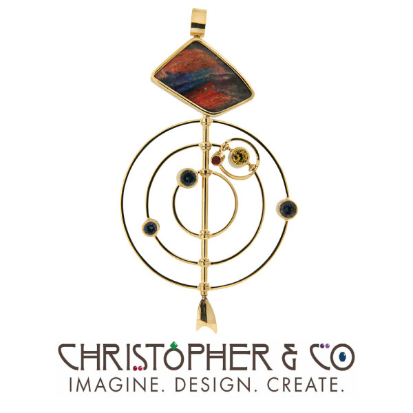 CMJ N 21106    Gold 3 D "Galaxy" pendant designed by Christopher M. Jupp set with multiple gems.
