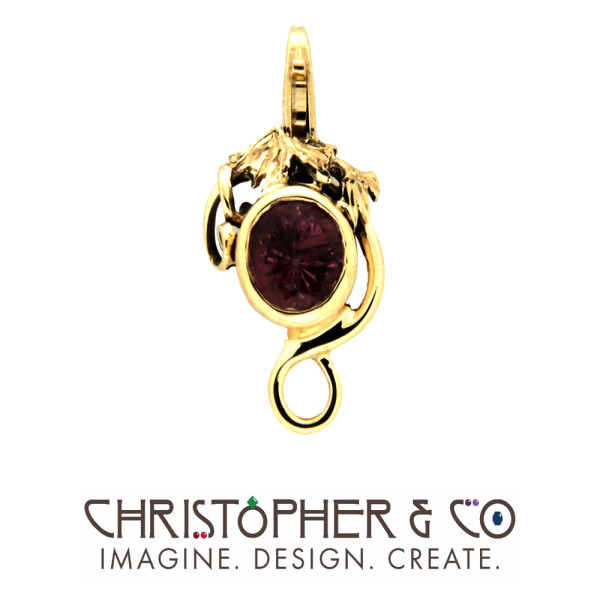 CMJ R 13017    Gold element set with pink tourmaline designed by Christopher M. Jupp.