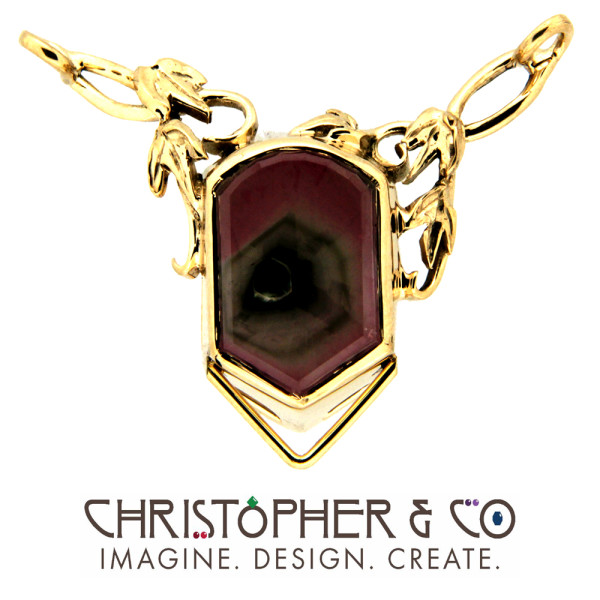 CMJ R 13018    Gold necklace set with watermelon tourmaline hand cut by Richard Homer designed by Christopher M. Jupp.