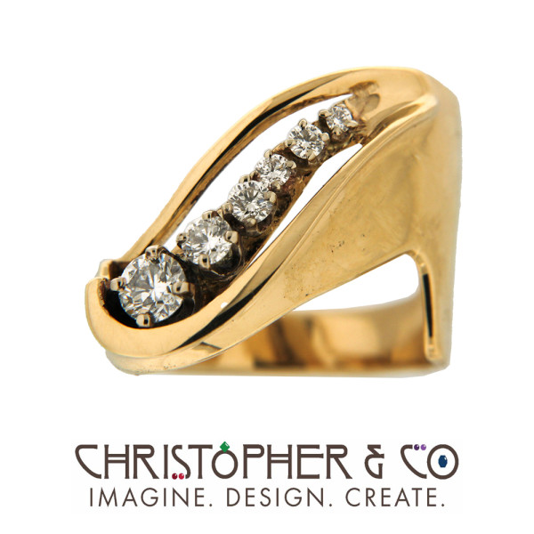 CMJ R 21105   Gold ring set with diamonds designed by Christopher M. Jupp.