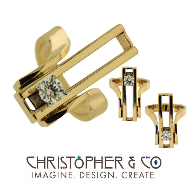 CMJ W 22018   Gold sliding gemstone diamond ring by Christopher M. Jupp.
