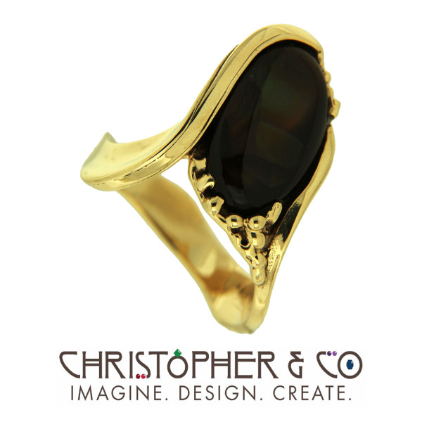 CMJ W 50453-001   Gold ring set with fire agate cabachon designed by Christopher M. Jupp