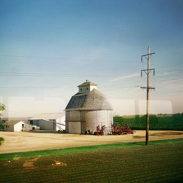 From An Amtrak Train, Majestic Farm Building, Il, 1996 by Alen MacWeeney