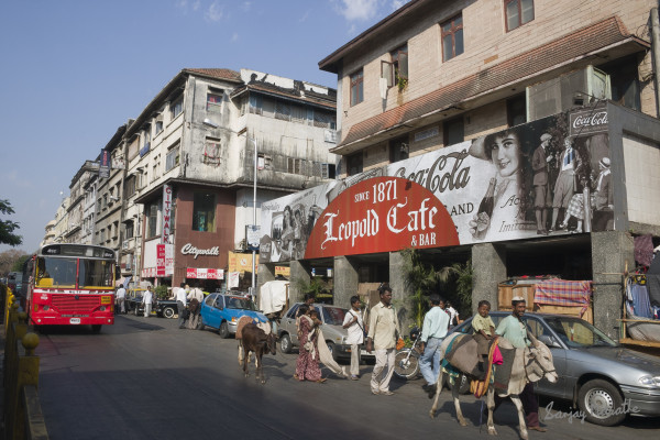 Rural Family Near Leopold Cafe, Mumbai (2006) by Sanjay Marathe