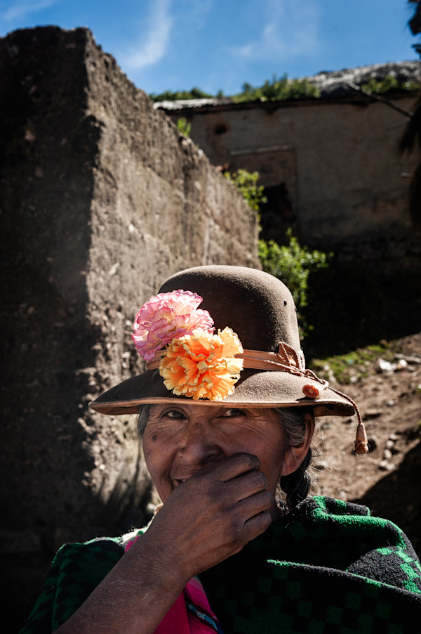 Untitled (Woman with two flowers) by Daniele Tamagni Foundation
