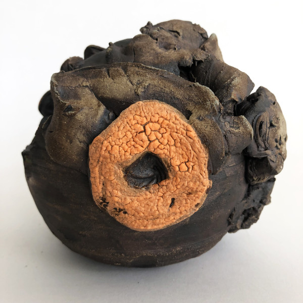 Geode - Black iron oxide with orange fungus and sea foam interior by Lynn Basa