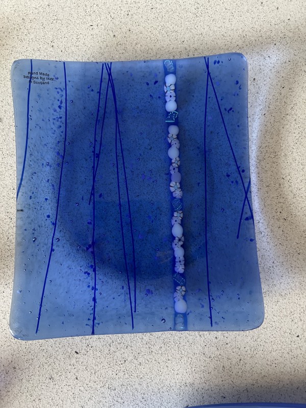 Blue fused glass plate by Inez Jenkins