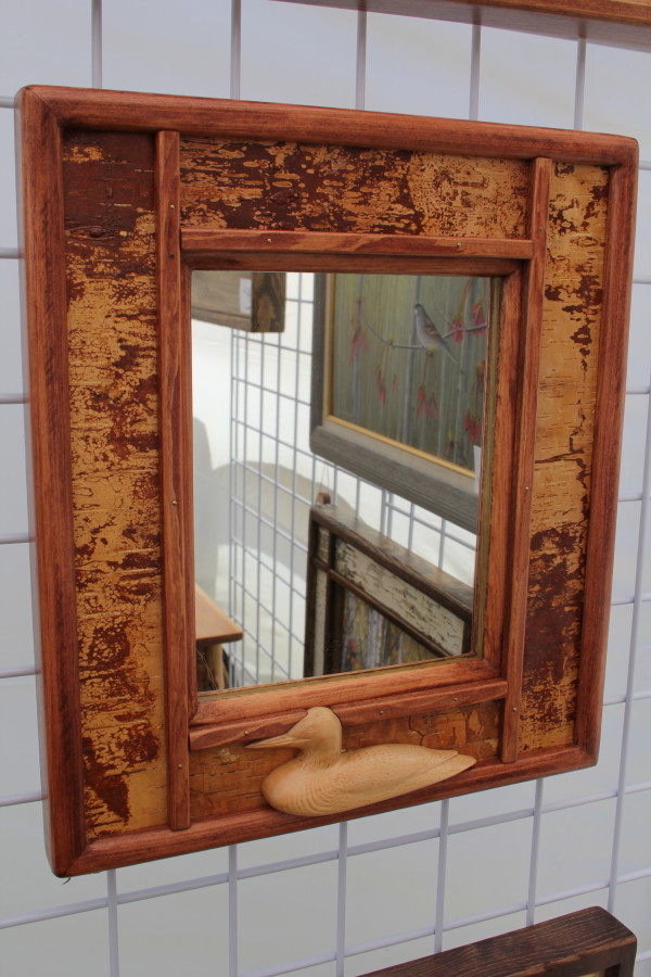 Small Mirror with Carved Duck