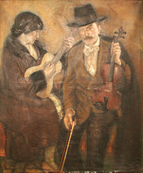Home, dona, violí i guitarra