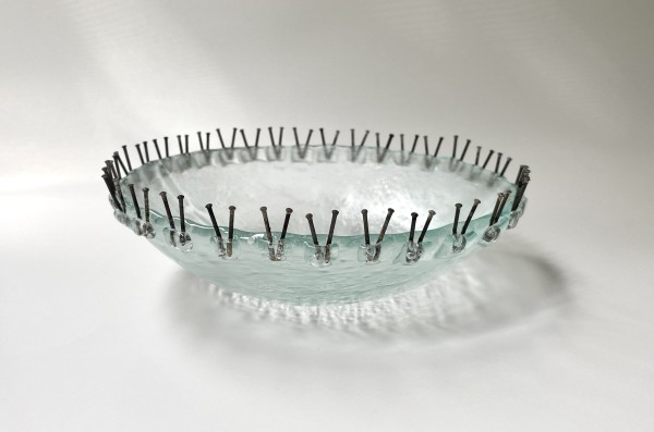 Bowl with nails by Claudia Henao