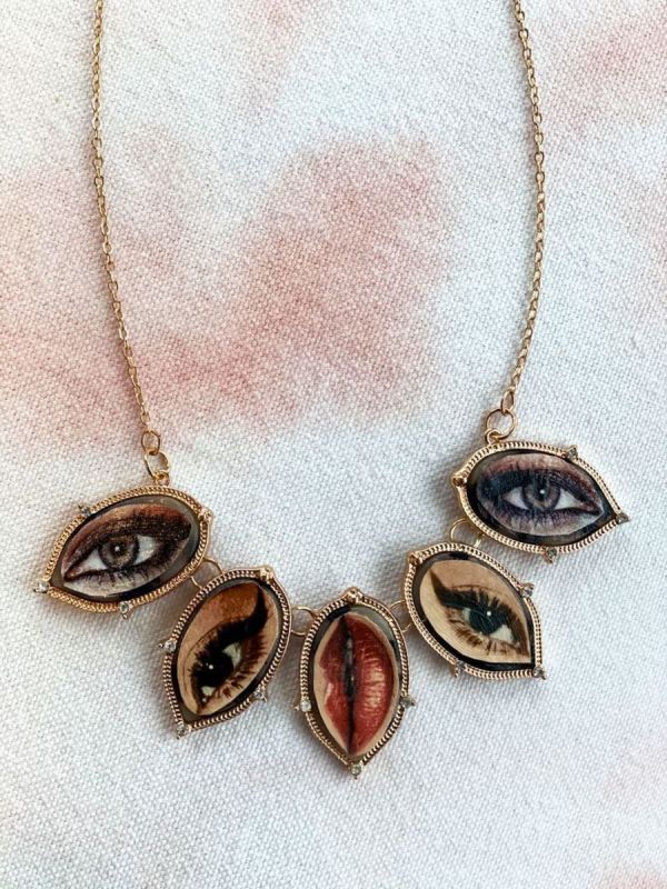Four Eyes (necklace) by Laura Collins
