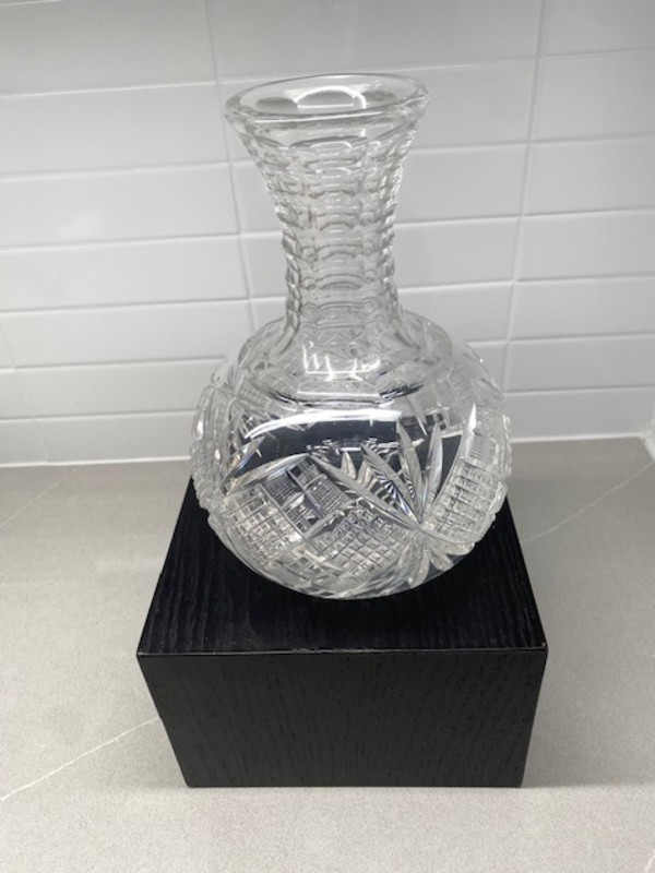 This is a vintage American brilliant cut glass water carafe or decanter featuring geometric patterns., Image 1.
