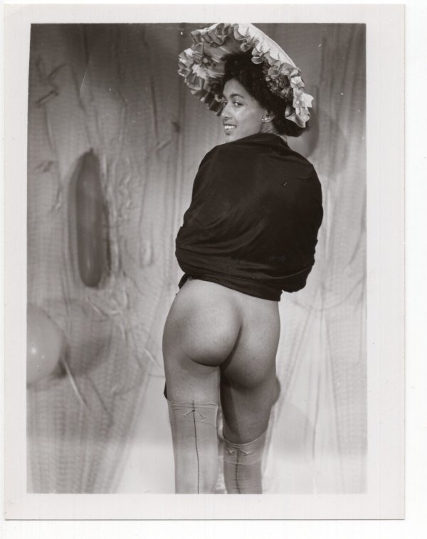 Pinup #7 in large floral hat by Unknown