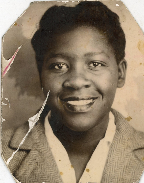 Woman in tweed jacket by Unknown