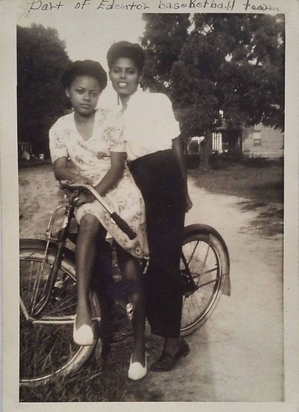 Part of Edenton basketball team (two girls on a bicycle) by Unknown