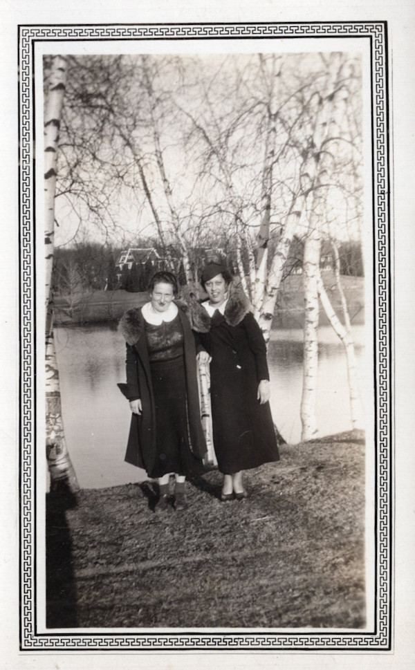 Two women in fur-collared coats by Unknown