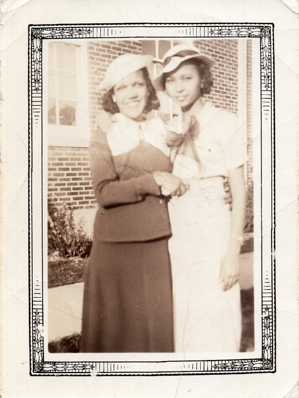 Two women embracing by Unknown