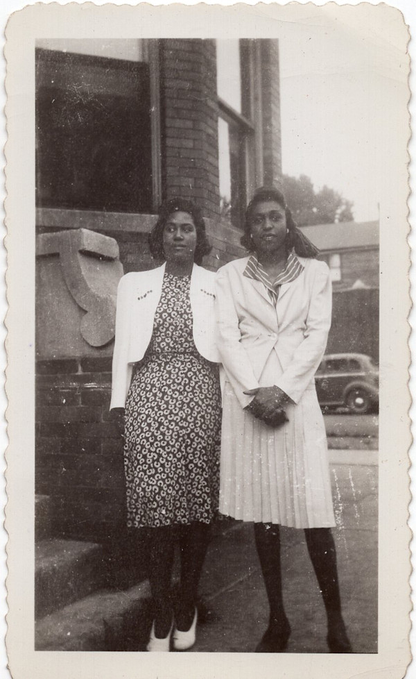 Two young women in white blazers by Unknown