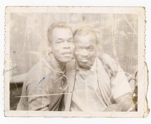 Two men embracing by Unknown