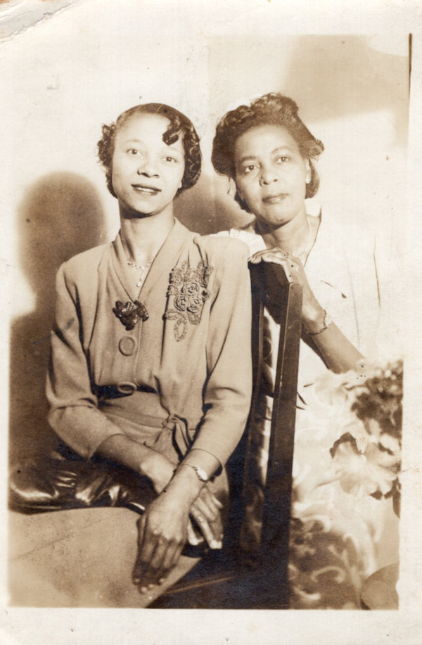 Two women posing by Unknown