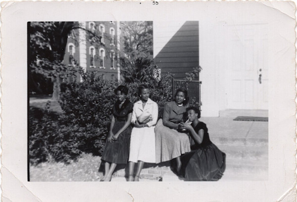 Four women (sneaking a sip) by Unknown