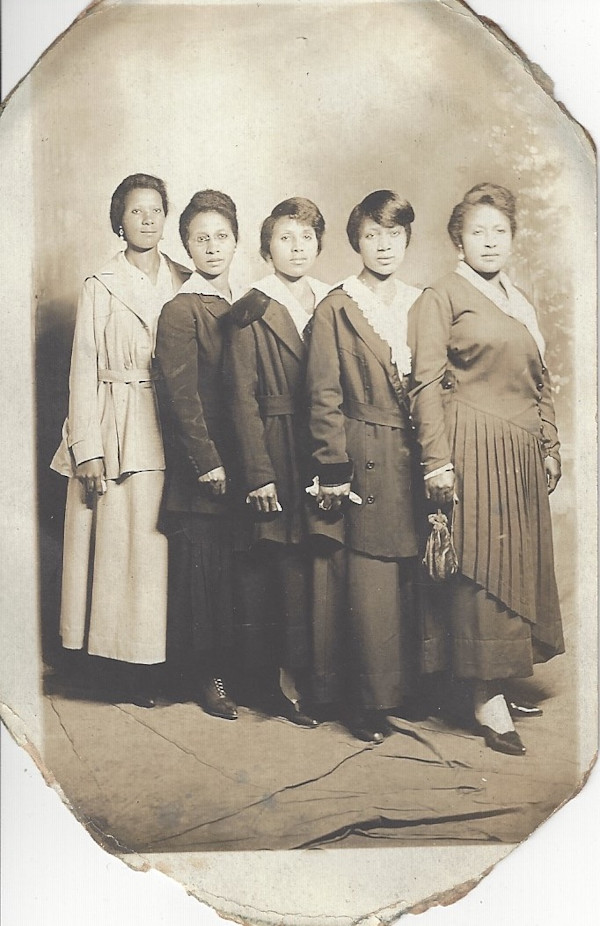 Five women posed in formation by Unknown